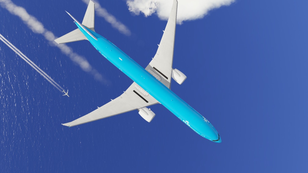 A KLM B777 flies over the ocean with another aircraft at a lower flight level visible